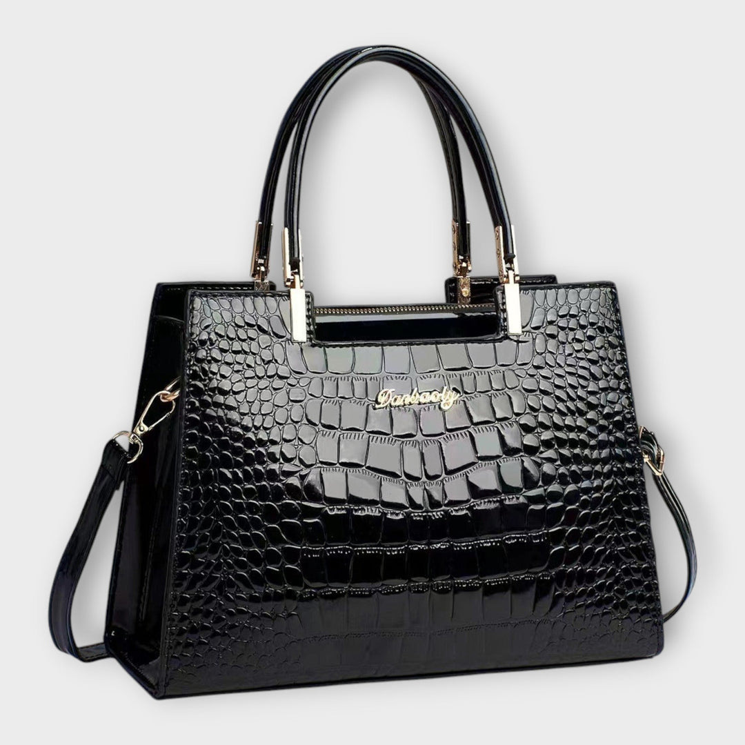 Léora. - Glossy Handbag with Crocodile Leather Pattern