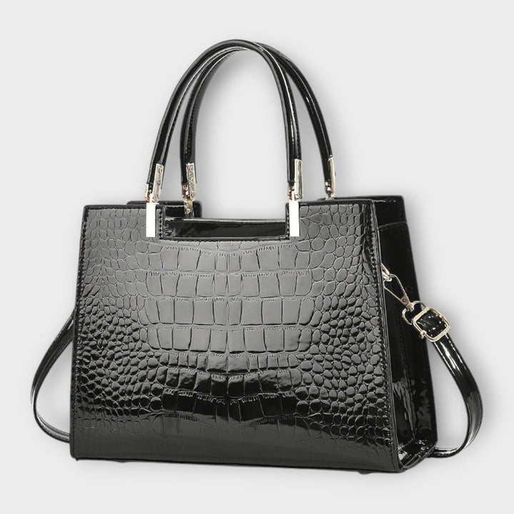 Léora. - Glossy Handbag with Crocodile Leather Pattern